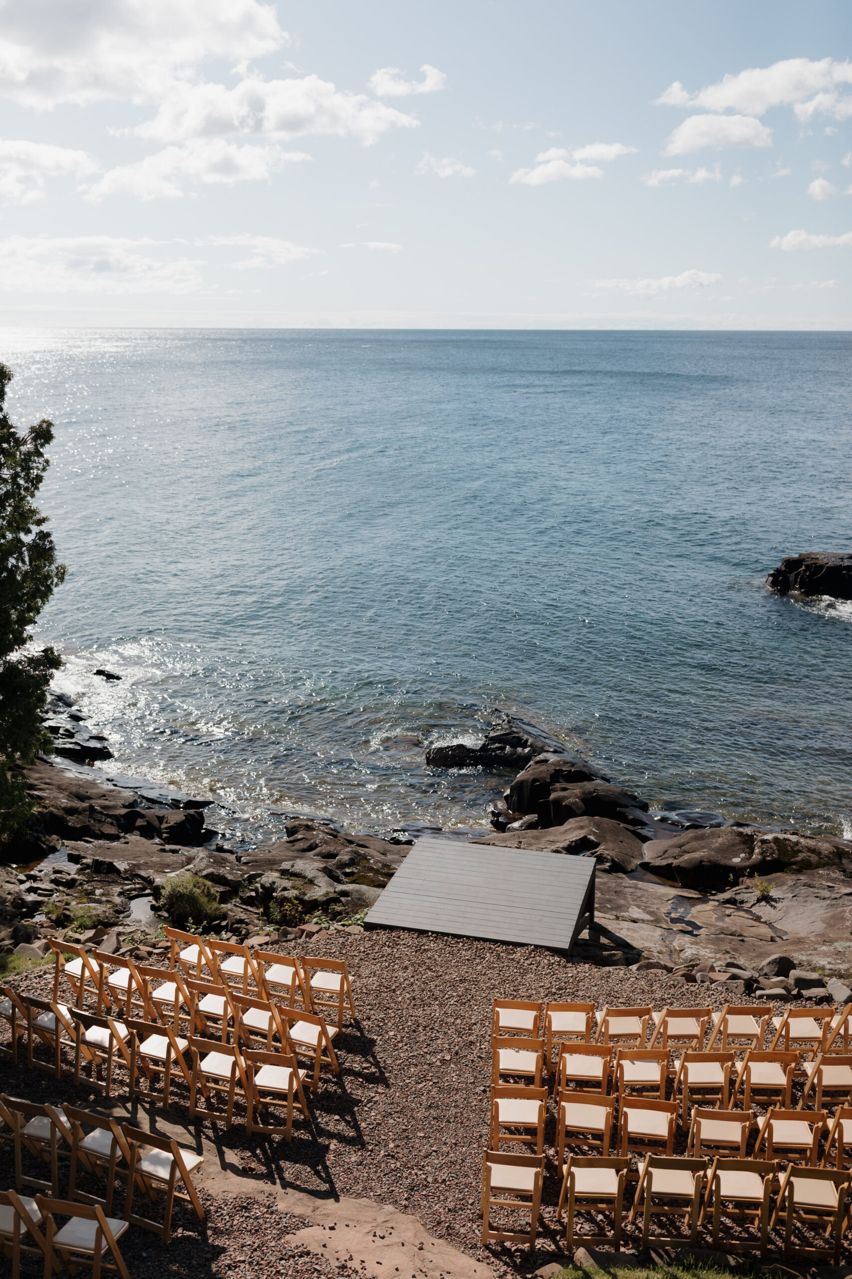 chairs set up facing the water for a wedding ceremony in Grand Marais, Minnesota